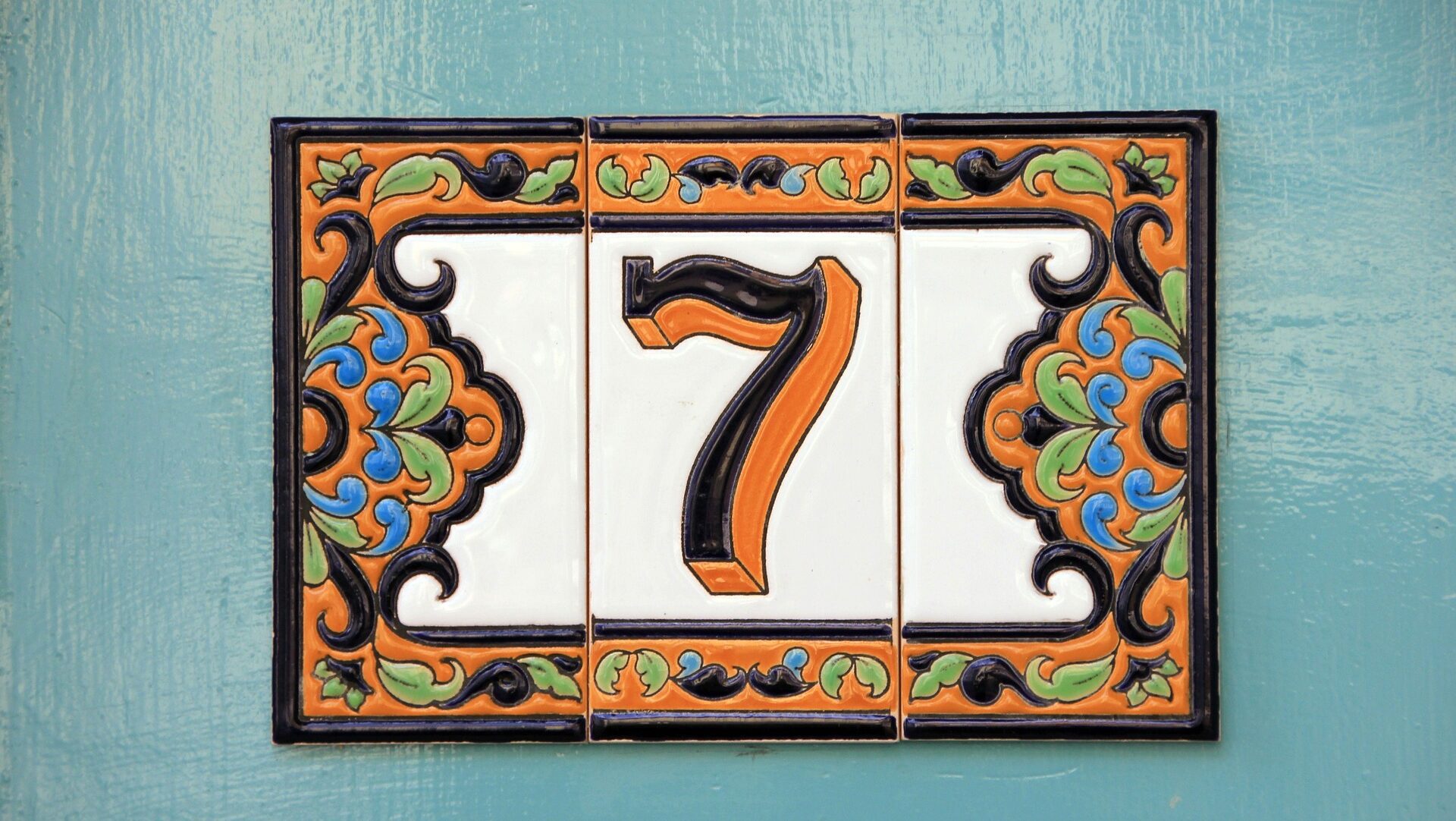 Number 7 displayed in decorative tile