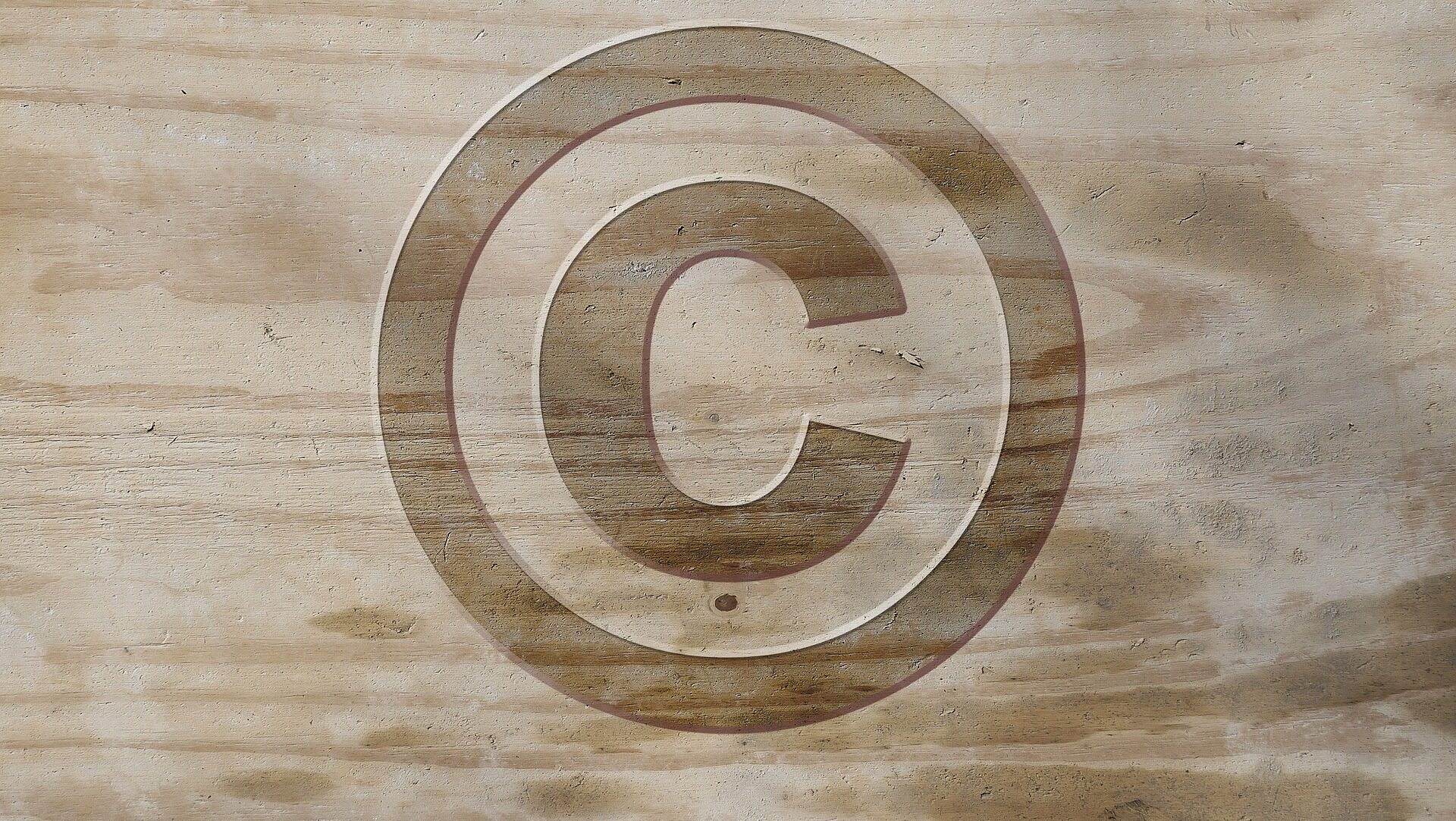Copyright image engraved in wood